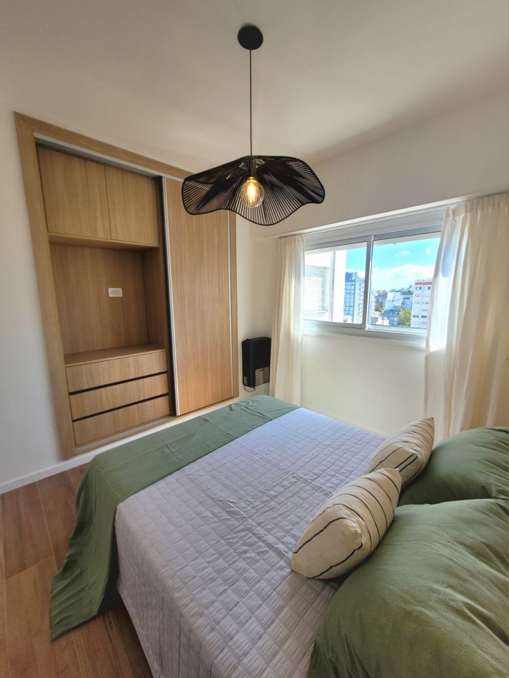 DEPARTAMENTO DE 2 AMB LATERAL ABIERTO CON ESPACIO DE COCHERA 